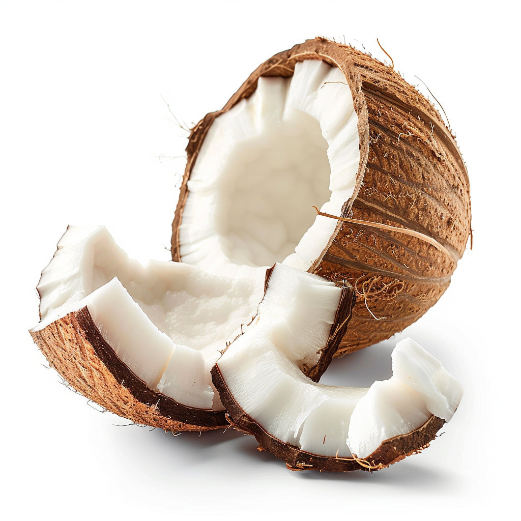 A halved coconut with the brown outer shell and fibrous husk visible, alongside three smaller broken pieces of coconut, showing the white edible flesh inside. The image is set against a white background.